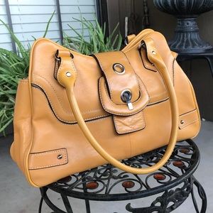 Wilson’s leather yellow tan leather purse
